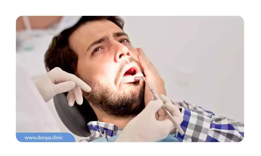 احساس درد شدید توسط فردی که کاشت ایمپلنت دندان انجام داده